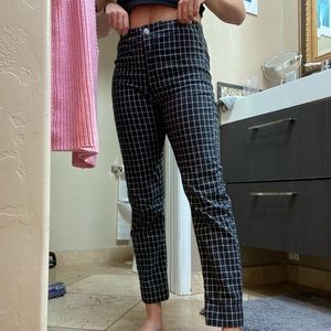 Brandy Melville black pants with white stripes!